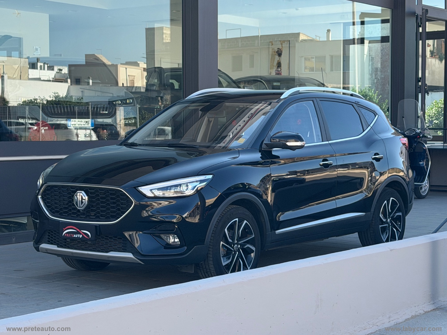 MG